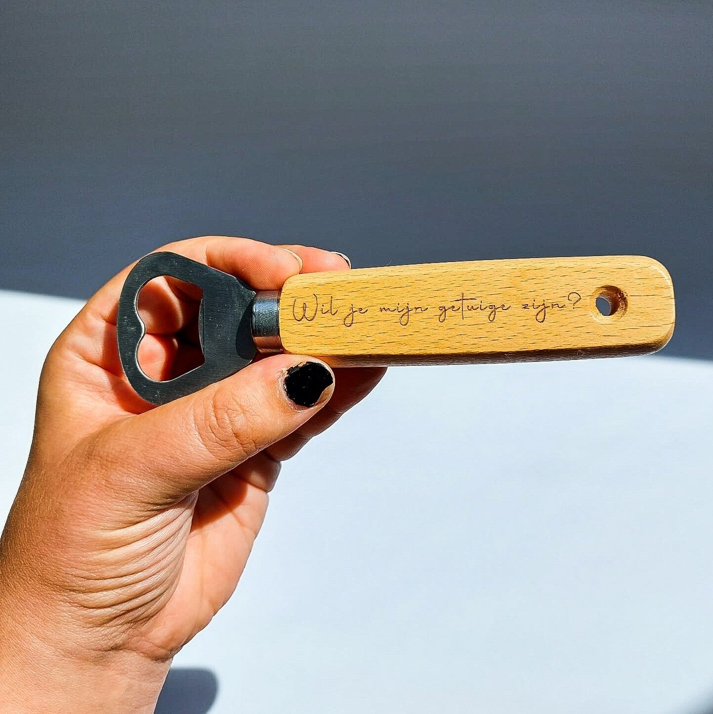 Flessenopener met gravure